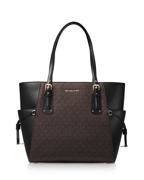 michael kors voyager east west tote brown|signature sinclair east west tote.